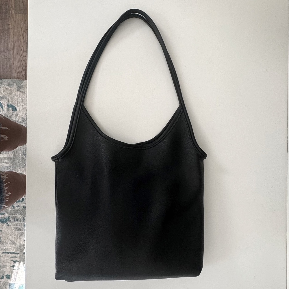Simple black leather purse with insert